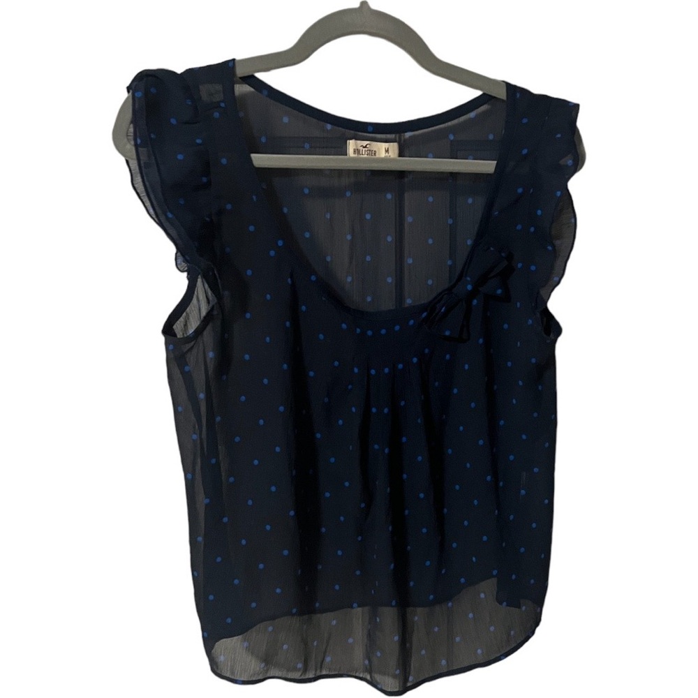 A Hollister top in blue and a medium